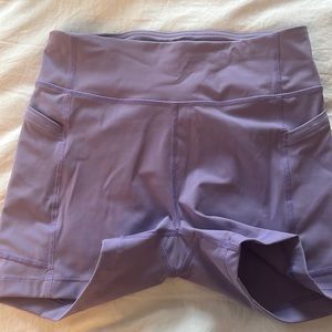 Purple outdoor voices bike shorts
